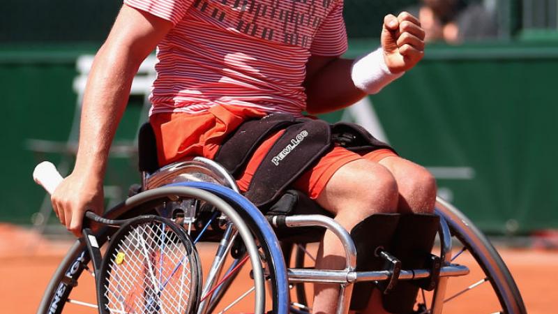 Alfie Hewett of Great Britain celebrates beating Argentina's Gustavo Fernandez in the mens singles wheelchair final at Roland Garros. 