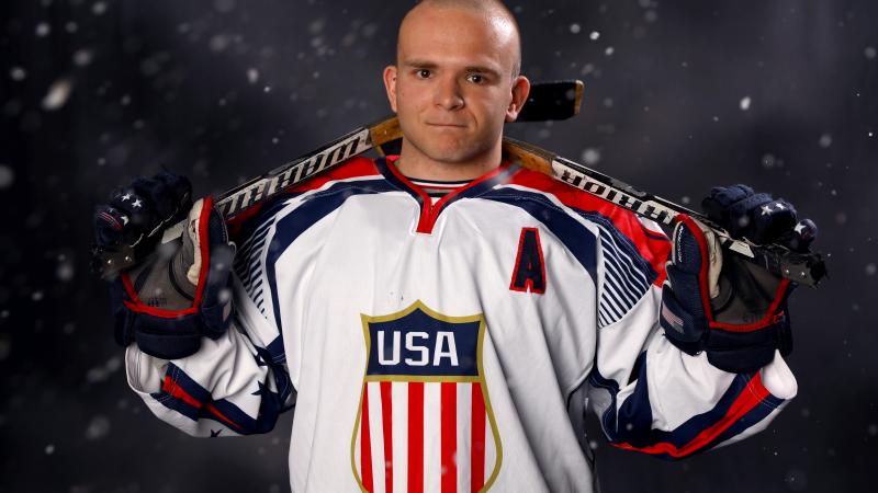a male Para ice hockey player