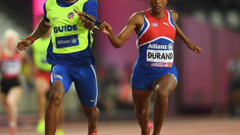 Omara Durand of Cuba crosses the line to win the Women's 100m T12 Final at the London 2017 World Para Athletics Championships.