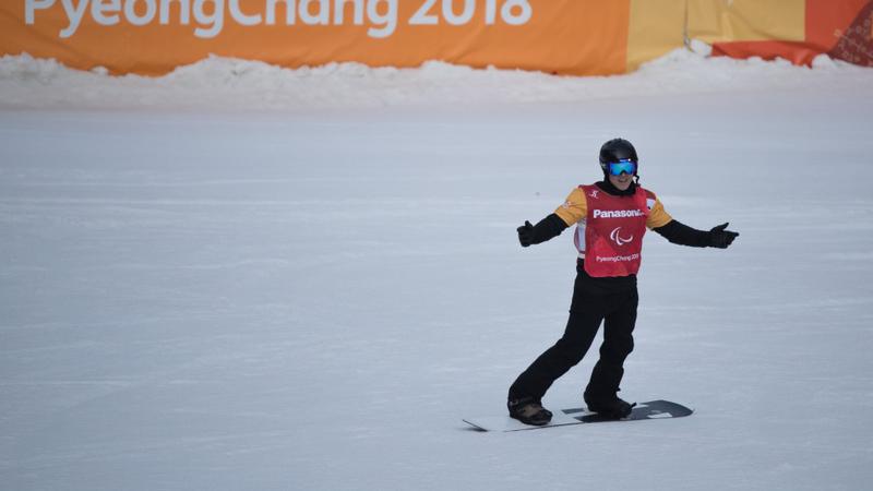 Athlete competing in snowboard