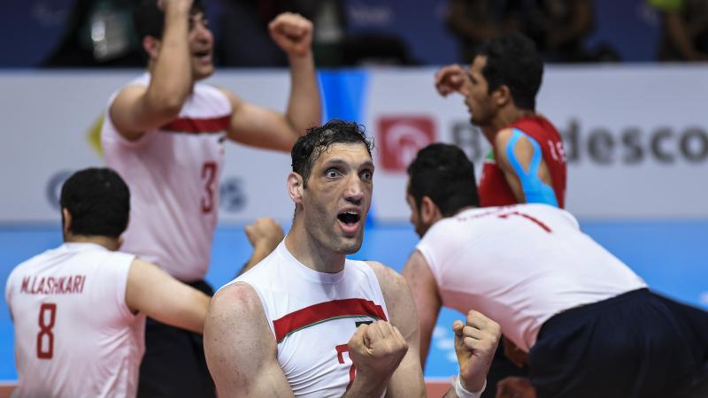 male sitting volleyball player Morteza Mehrzadselakjani celebrating a point