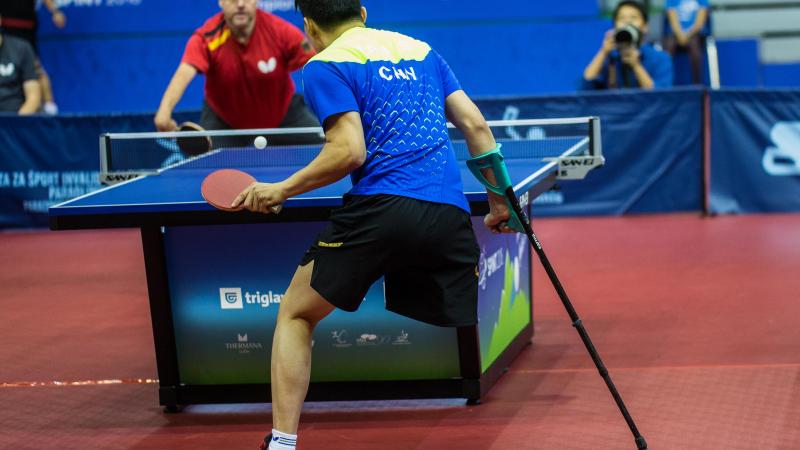male Para table tennis player Yan Shuo plays a forehand