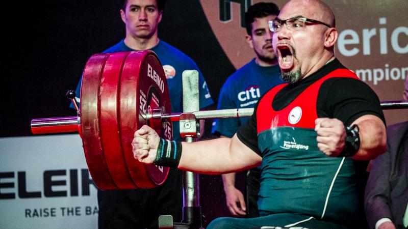 Chile's Juan Carlos Garrido celebrates winning gold at the Bogota 2018 orld Para Powerlifting Americas Open Championships.