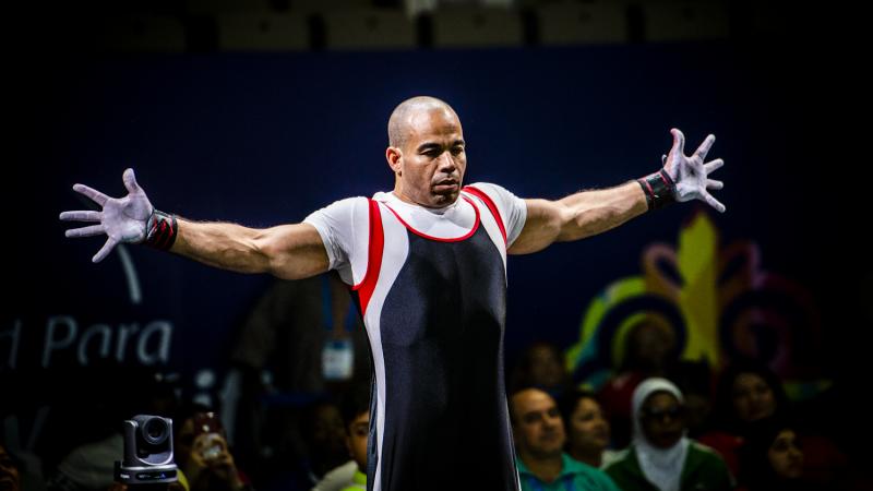 Egyptian powerlifter Sherif Osman opens his arms