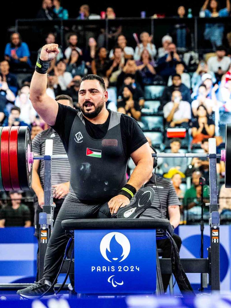 An athlete reacts after his lift