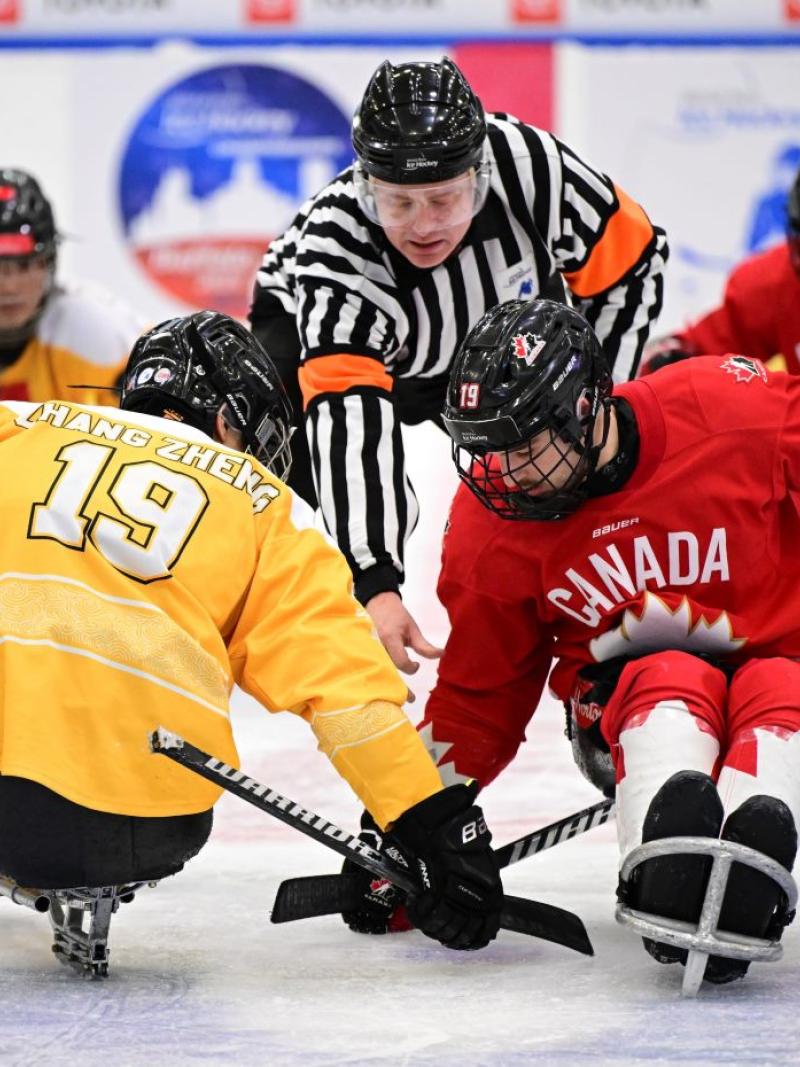 Canada and China playing a Para ice hockey game