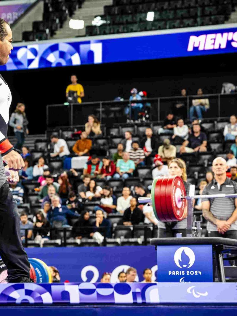 An athlete goes for a lift