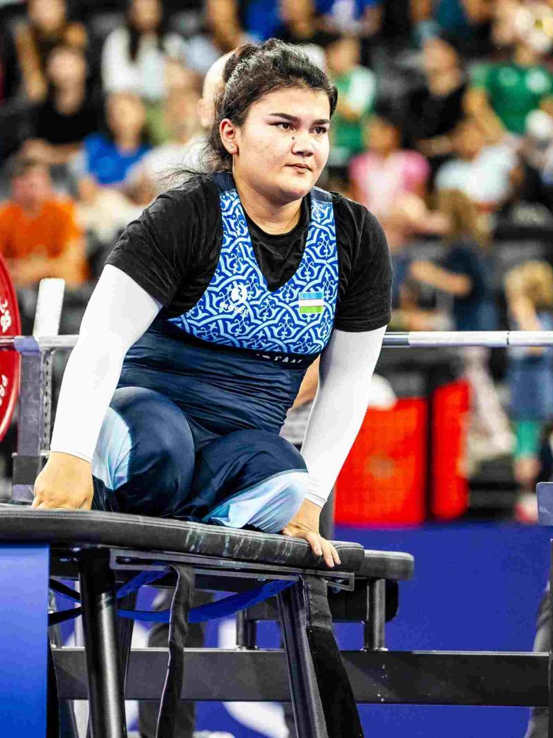 An athlete reacts after a lift