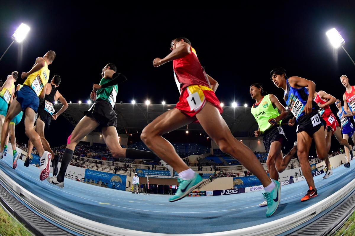 Athletes run through the track at the Dubai 2019 World Championships