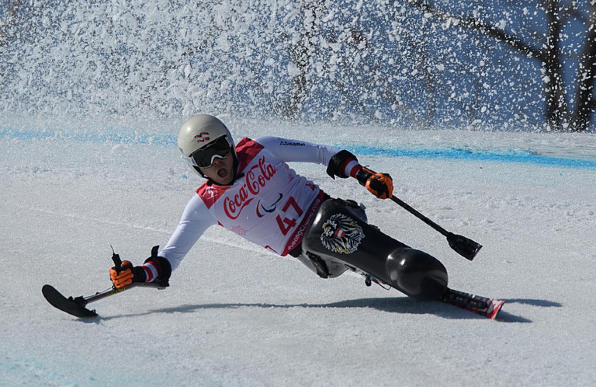 A male sit-skier competing at the PyeongChang 2018 Paralympic Winter Games