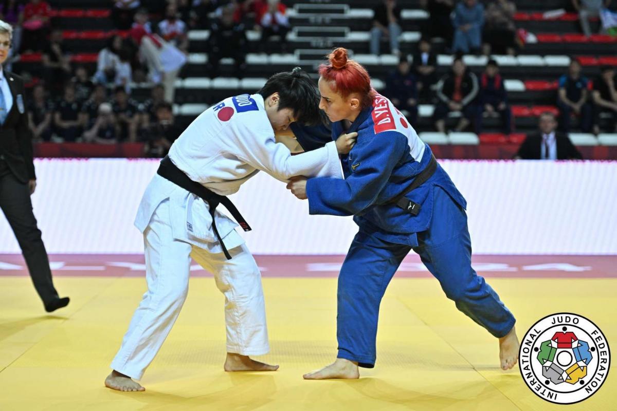 Two female judokas in action