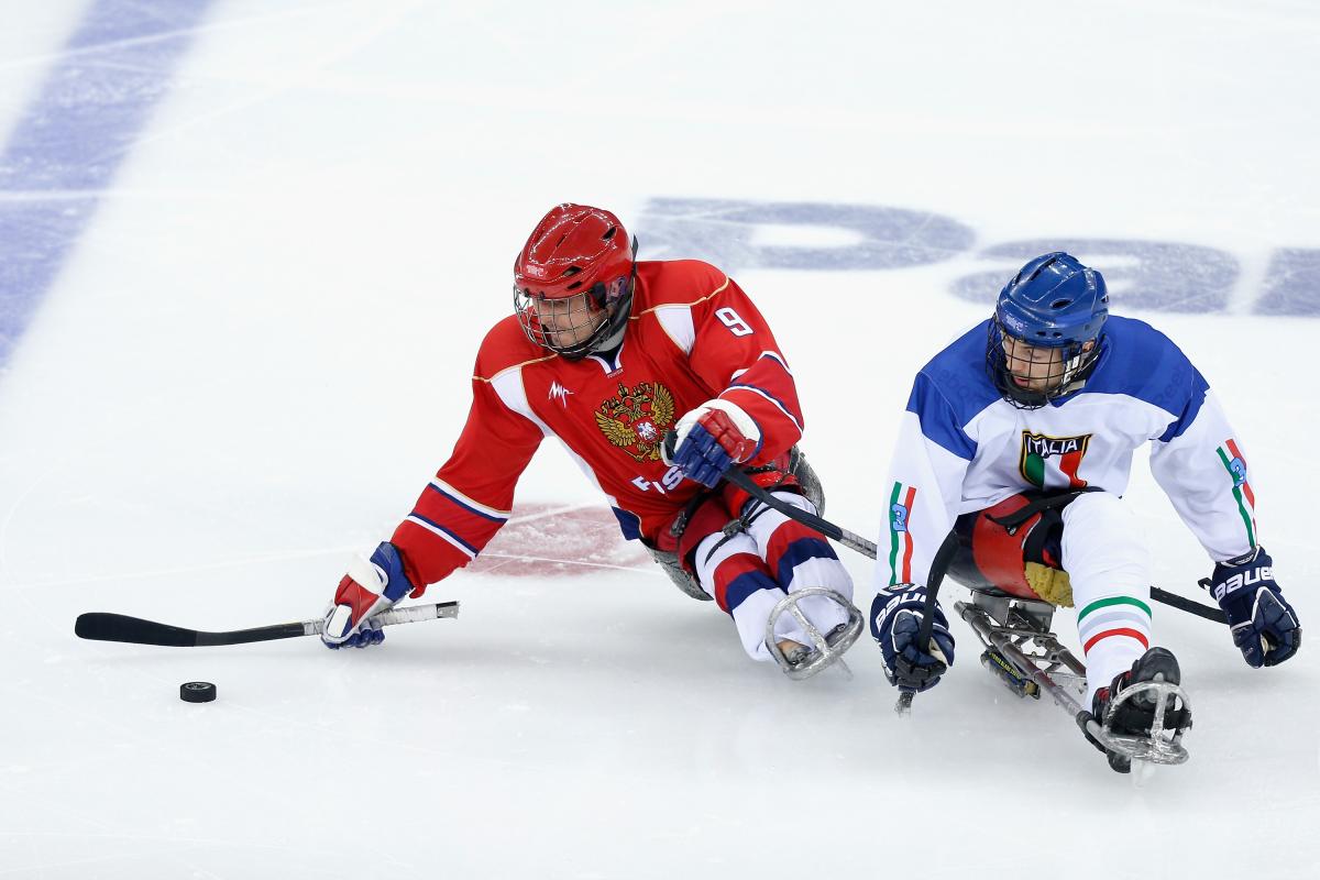 Konstantin Shikhov of Russia (L) is pressured by Gianluigi Rosa of Italy