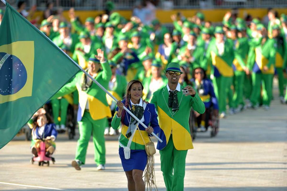 Brazilian sprinter Terezinha Guilhermina carrying the Brazilian flag during the Toronto 2015 Opening Ceremony