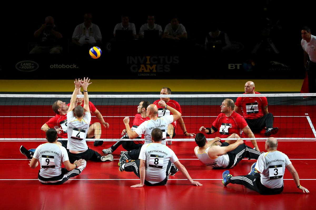 Michael Frenzke of Germany competes in the Sitting Volleyball 5th/6th Place Playoff between Denmark and Germany at the Copper Box Arena on day four of the Invictus Games.