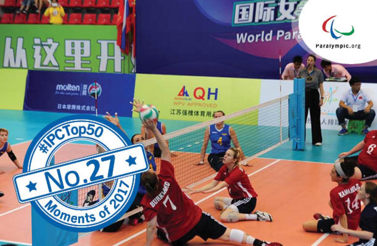 female sitting volleyball players in action on the court