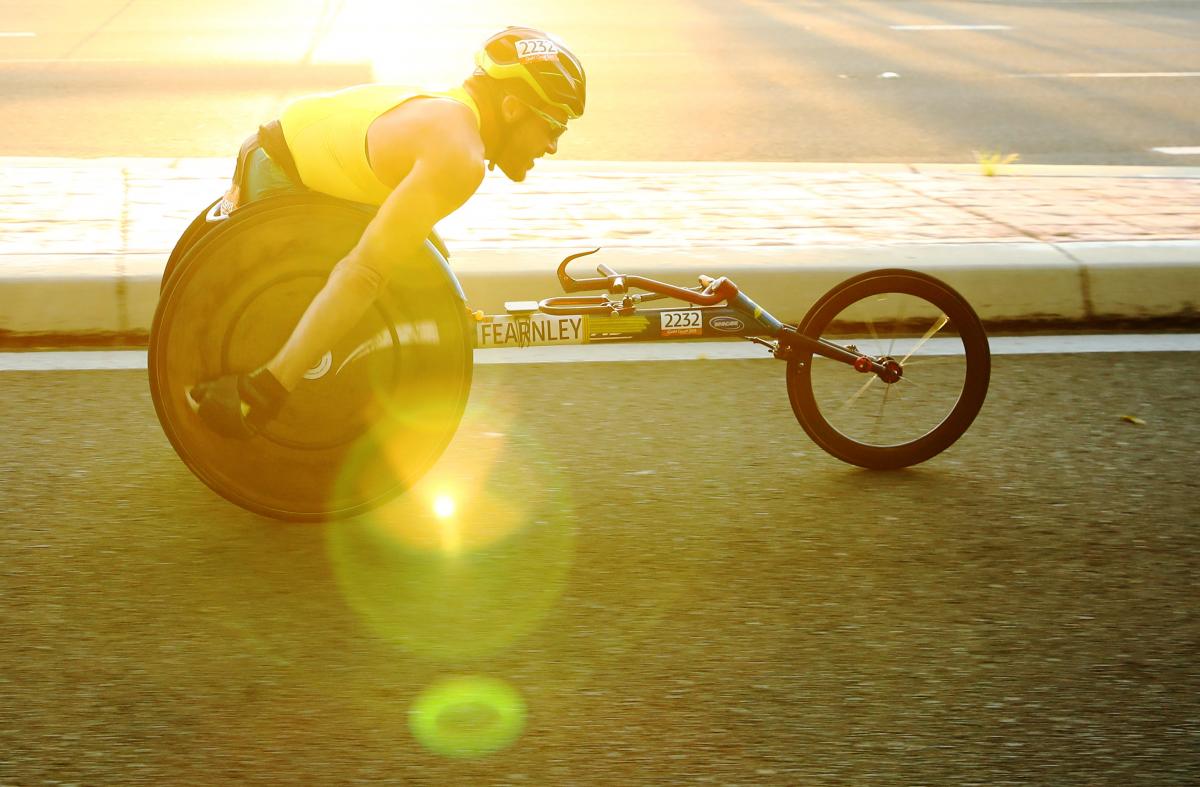 Athlete on wheelchair taking part in race