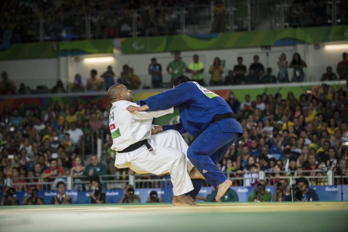 two judoka fighting on the mat