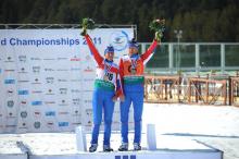 Skier on the podium with her guide