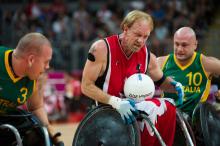 Athlete practicing wheelchair rugby.