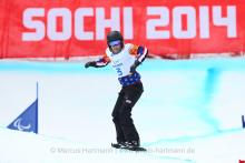 Amy Purdy, USA wins the bronze medal in the Women's Para Snowboard Cross