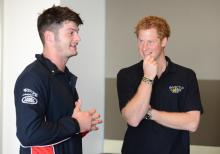 British sprinter Dave Henson meets Prince Harry at the 2014 Invictus Games.