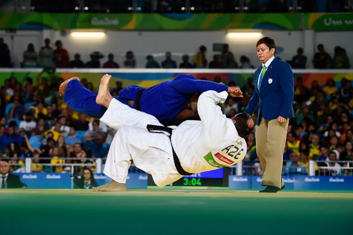 Ilham Zakiyev throws his opponent to the ground