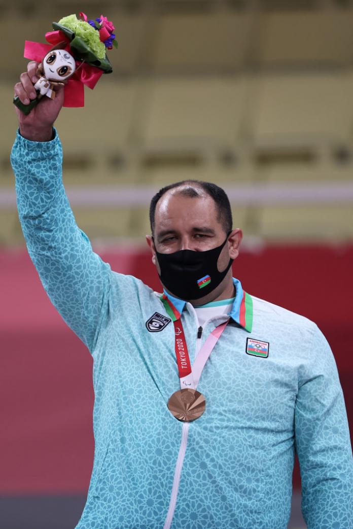 Ilham Zakiyev on the podium with his bronze medal