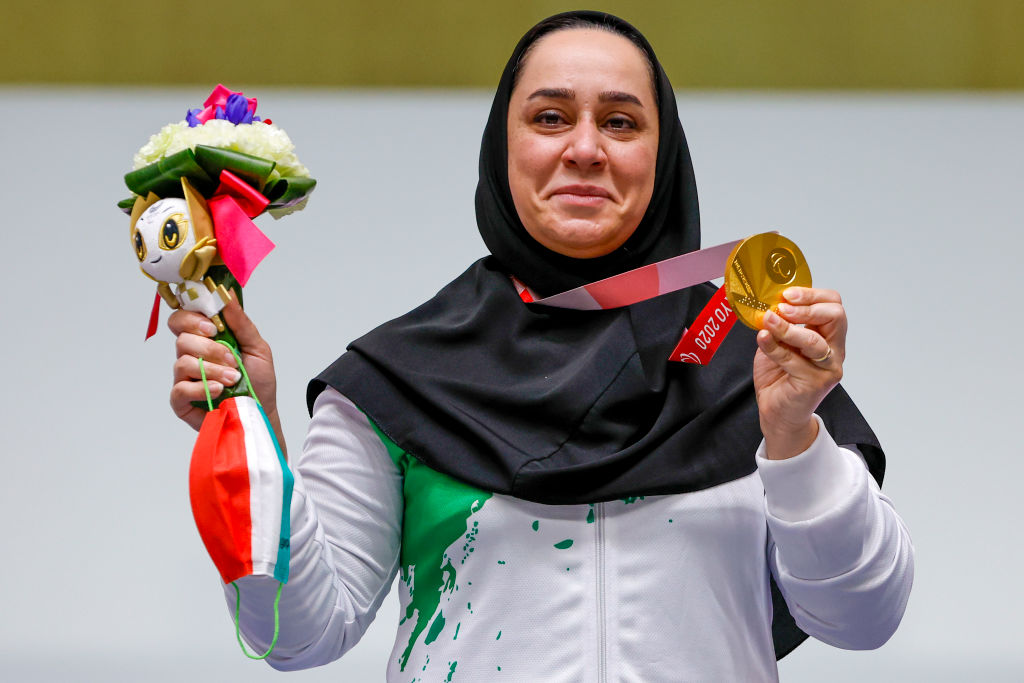 Sareh Javanmardi displays her gold medal and mascot