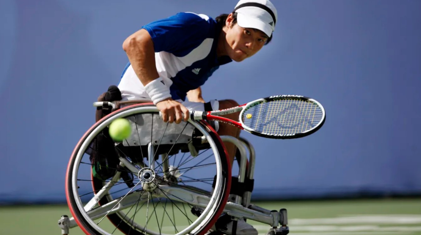 Shingo Kunieda competes in a wheelchair tennis quarter-final match against Stefan Olsson of Sweden during the Beijing 2008 Paralympic Games 