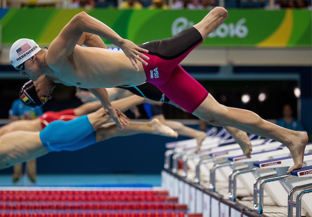 One world and multiple Paralympic records tumble in swimming heats at