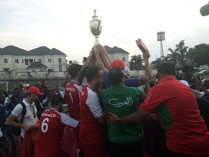 Moroccan players lift the African Championships trophy