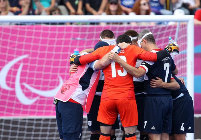 Football team in their huddle