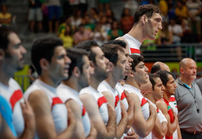 Iranian sitting volleyball team and the tallest Paralympian  Morteza Mehrzadselakjani line up to sing their national anthem