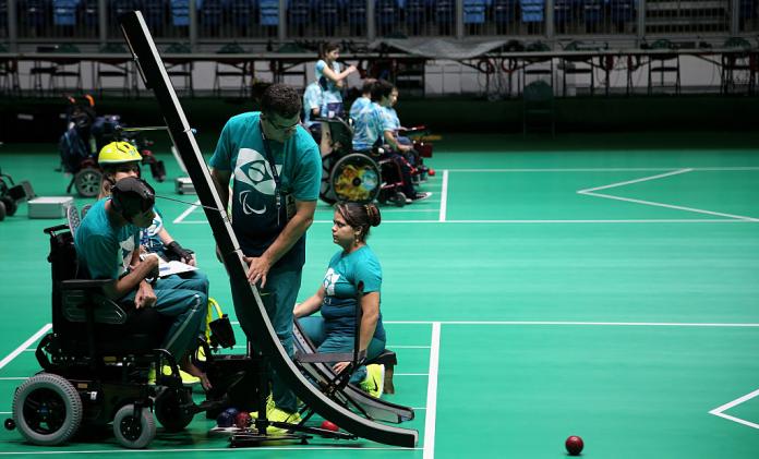 Brazilian boccia team training in the arena with their assistants