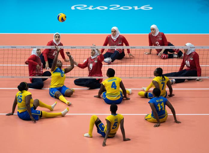 Rwandan and Iranian women's sitting volleyball teams competing