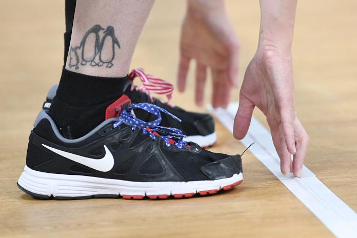 Goalball player touches marked line to know where to take position