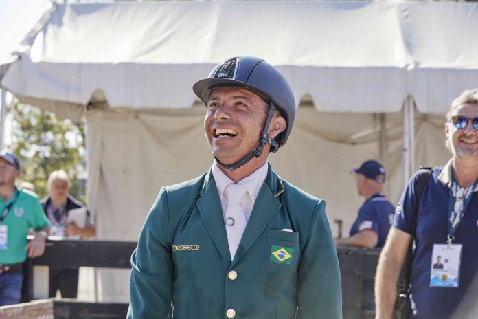 Brazilian male equestrian rider smiling