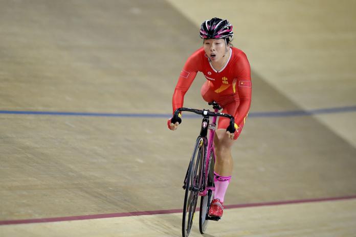 Chinese female athlete with a leg run on the velodrome track