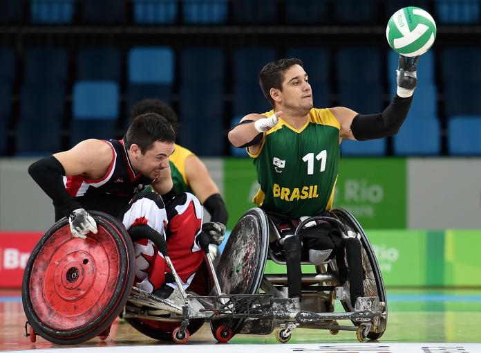 ​​​​​​​Canadian wheelchair rugby player Patrice Dagenais defending against Brazilian player