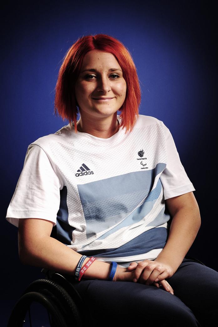 British wheelchair rugby player ​​​​​​​Kylie Grimes poses for the camera