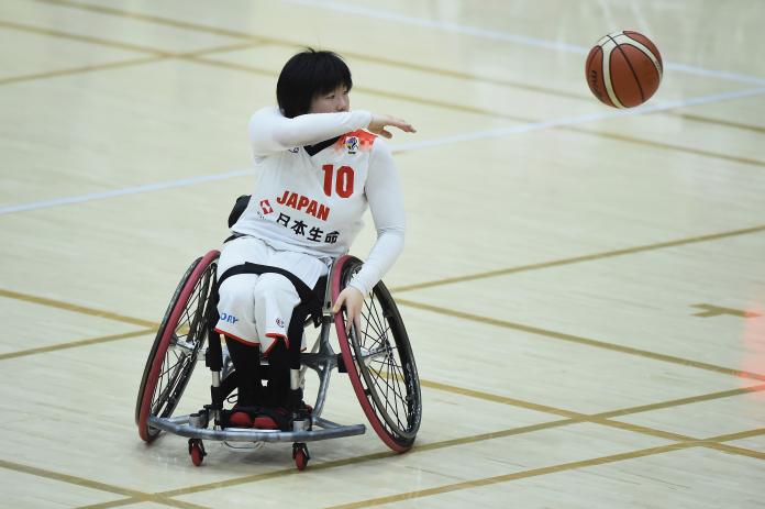 Japanese wheelchair basketball player Mayo Hagino making a pass