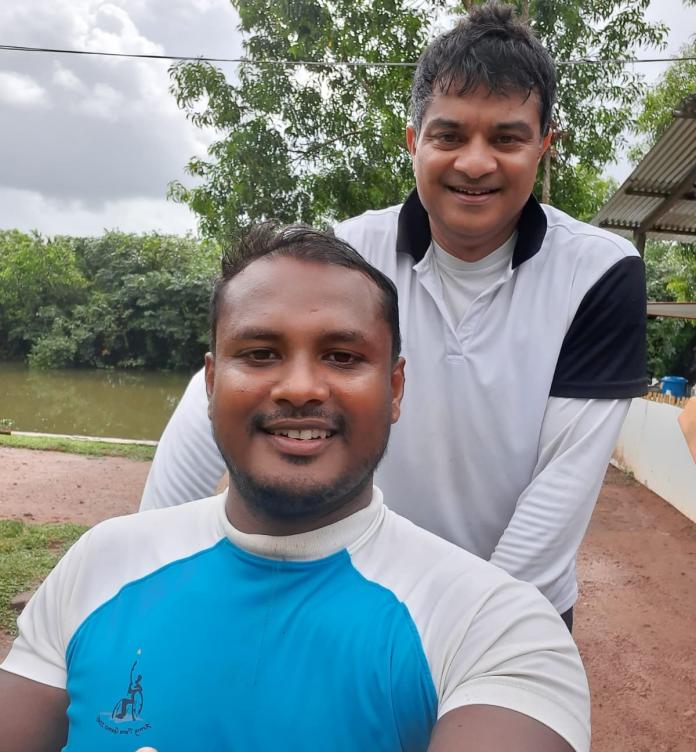 Mahesh Jayakody with his coach Lasantha Welikala