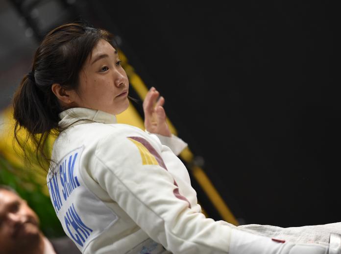 Chinese wheelchair fencer Shumei Tan stares ahead