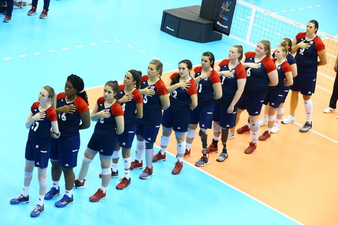 USA women's sitting volleyball team line up during their national anthem