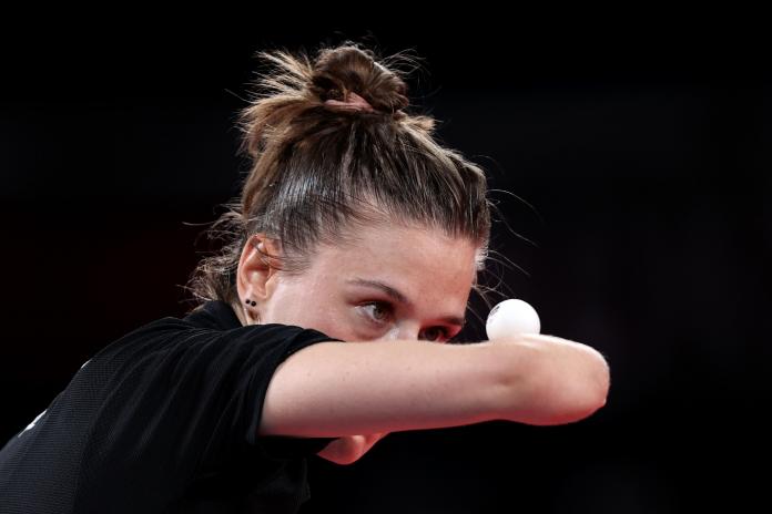 Poland's table tennis player Natalia Partyka stares at the ball before serving