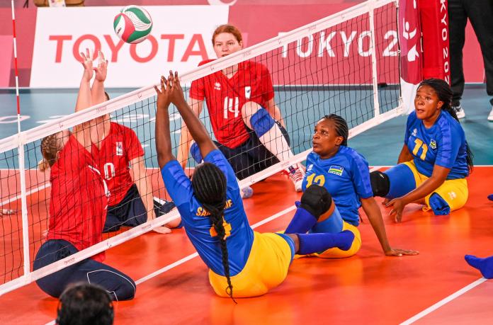 Rwanda female sitting volleyball team in action against RPC