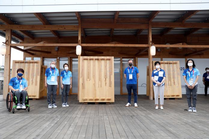 IPC President Andrew Parsons, Tokyo 2020 President Seiko Hashimoto, Governor of Tokyo Yuriko Koike, and Tokyo 2020 Village Mayor Saburo Kawabuchi standing in front of Paralympic Mural at the Village Plaza