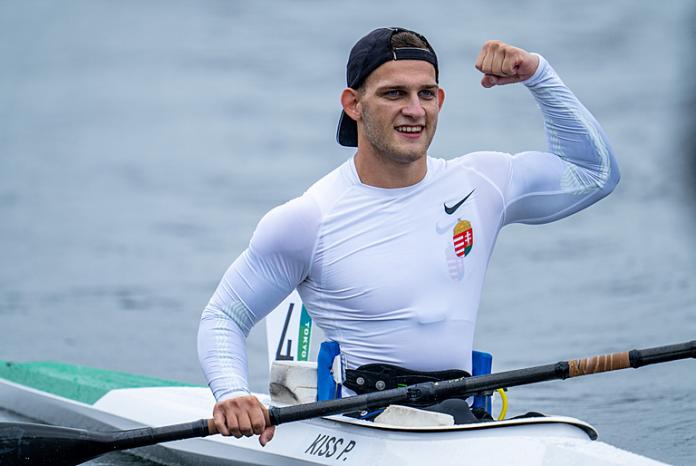 Peter Pal Kiss raises his arm in celebration as he wins gold