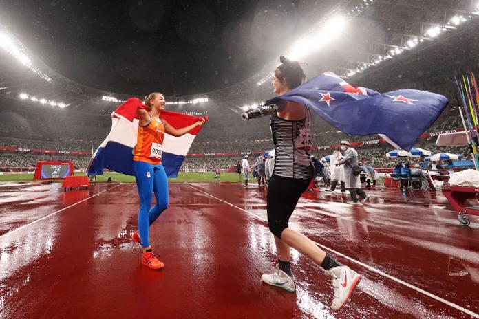 JUBILANT: Silver medalist Noelle Roorda (L) of Team Netherlands celebrates with gold medallist Holly Robinson of Team New Zealand following the Women's Javelin Throw - F46 Final.
