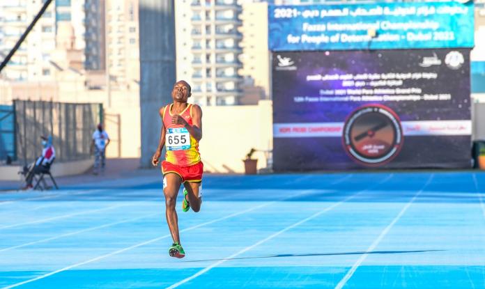 Zambian runner Lassam Katongo on the track